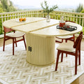Mesa de comedor con tablero redondeado y pie central - amarillo